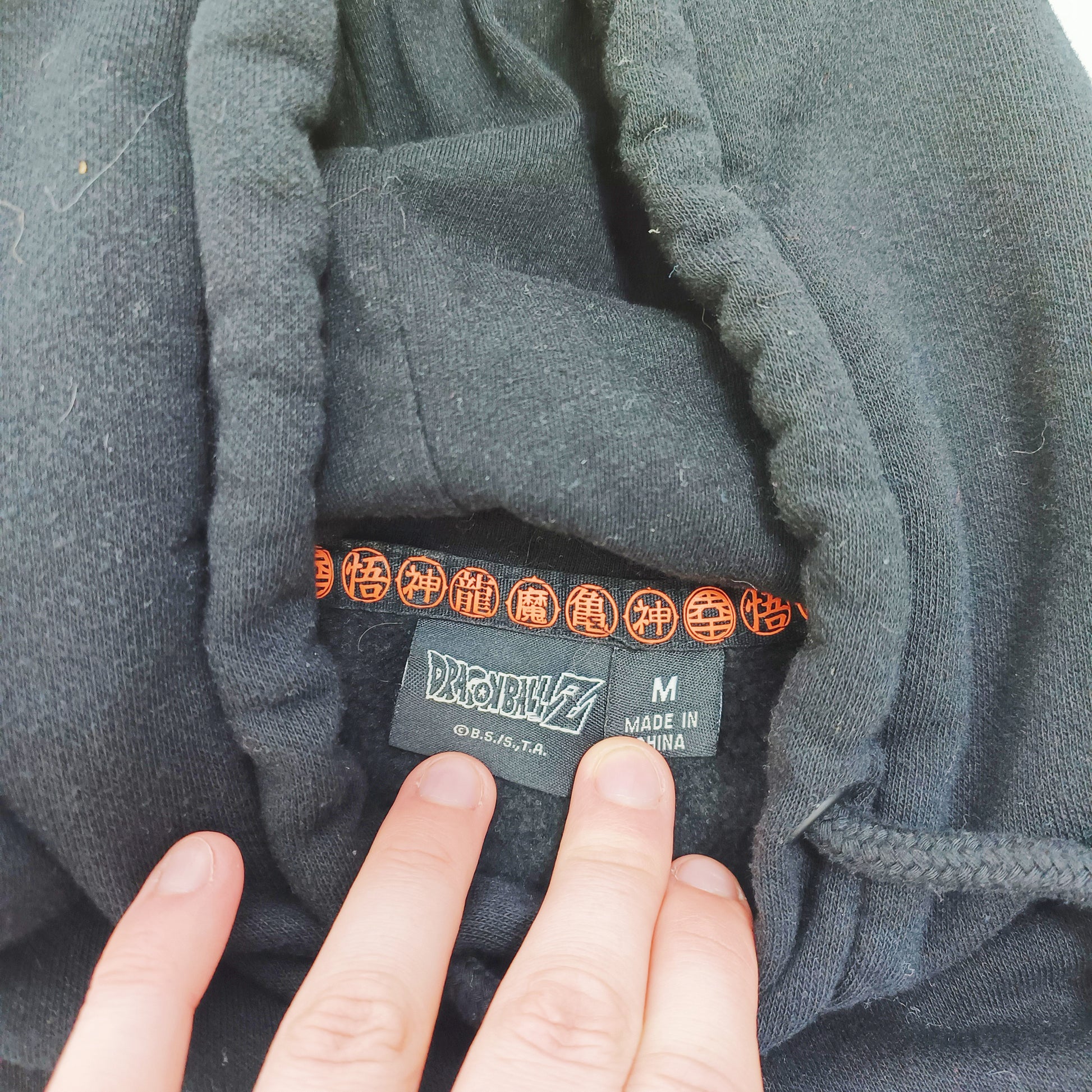 Black Slogan Green & Orange Detailed Hoodie Size Medium | Preloved